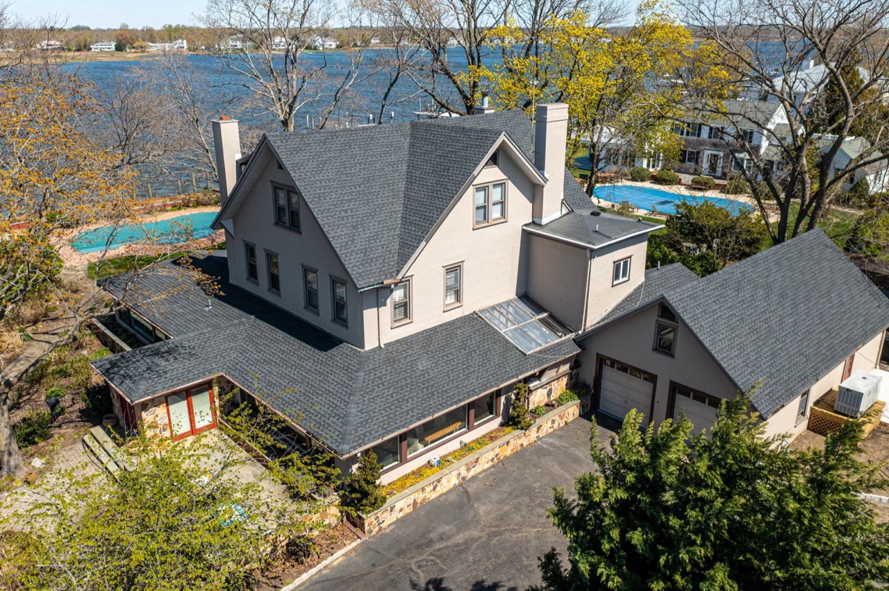 After: the finished charcoal architectural-shingle roof